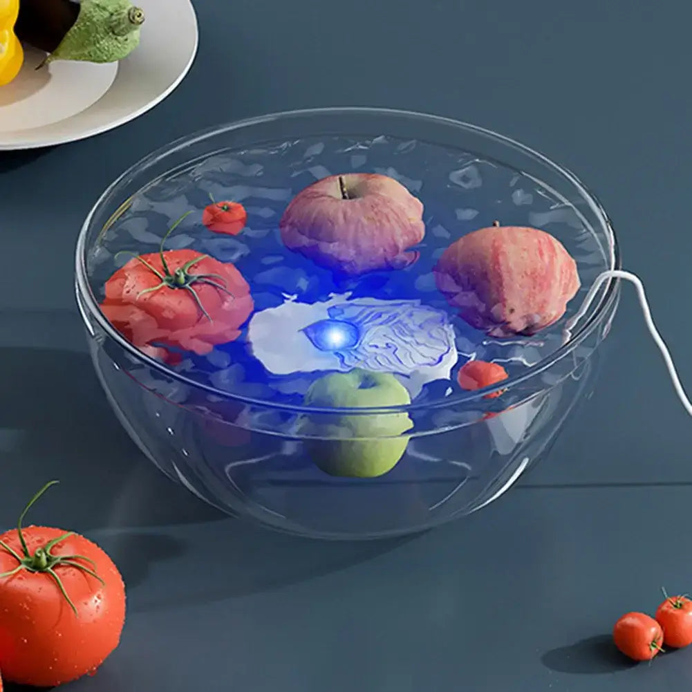 NATURA electric food purifier with fruits floating in water and blue light enhancing freshness and cleanliness.